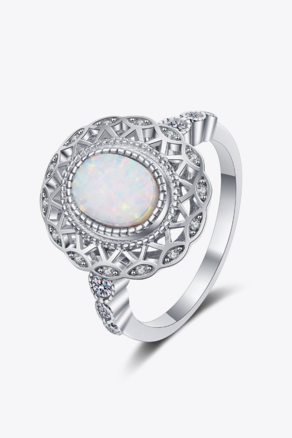 Feeling The Love 925 Sterling Silver Opal Ring displayed in a flat lay style, showcasing its minimalist design and opal stone.